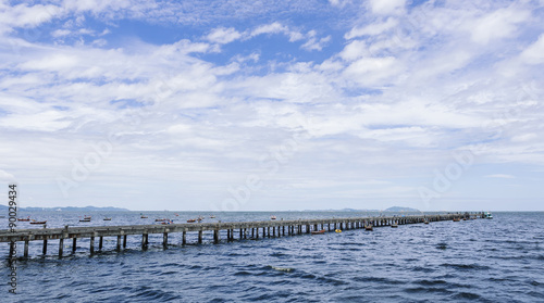 Bridge along the Ocean with Blue sky landscape