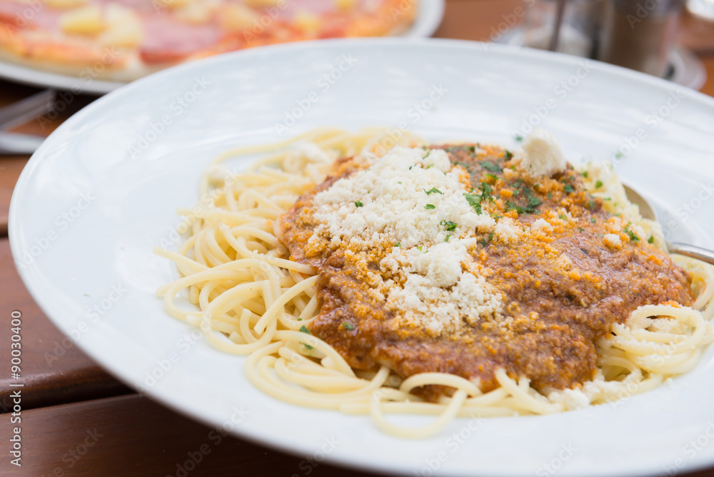Spaghetti bolognese with parmesan cheese. Selective focus. Spaghetti bolognese with parmesan cheese. Selective focus.