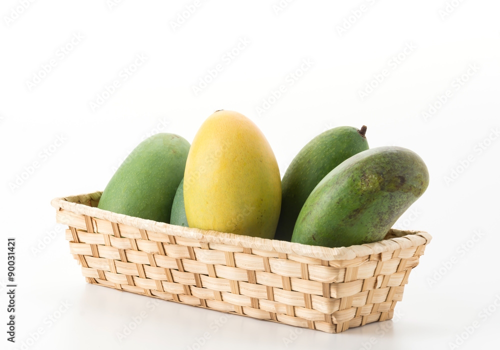 green and yellow mango on white background