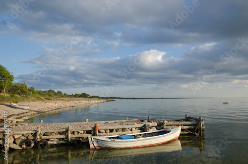 Sunlit old wooden boat