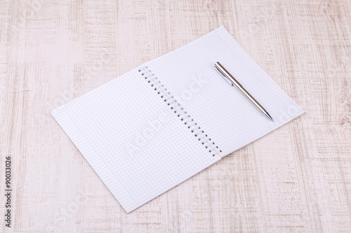 blank white notebook on the desk