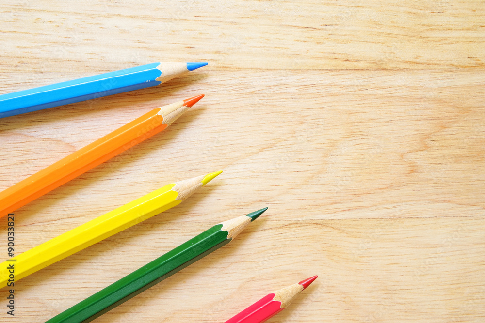 Color pencils on wood background Color pencils on wood background