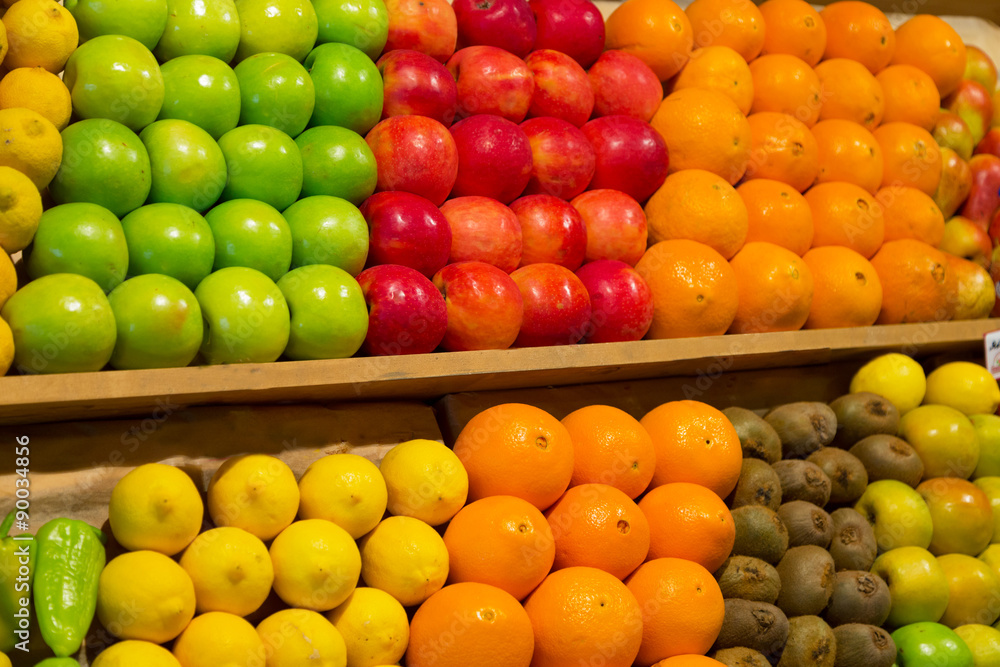 Various fruit on a counter in the market or in shop Various fruit on a counter in the market or in shop