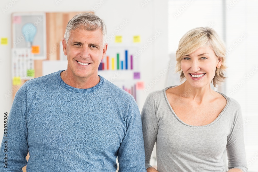 Smiling business colleagues looking at the camera