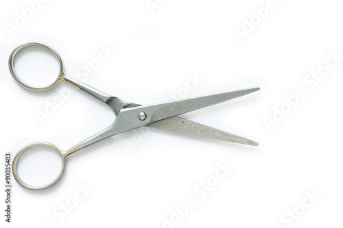 Scissors on white background