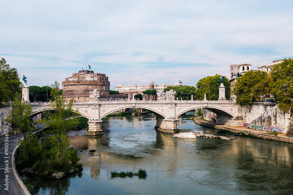 View on bridge over the Tiber river and Saint Angel castle,  Rome, Italy.