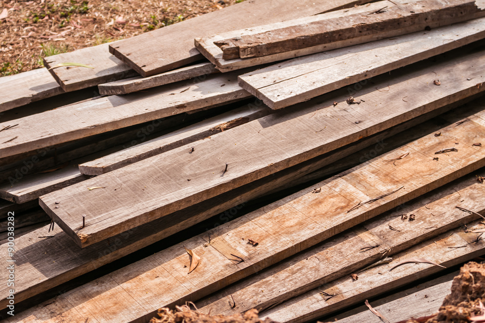 Pile of old wood logs from old house. Pile of old wood logs from old house.