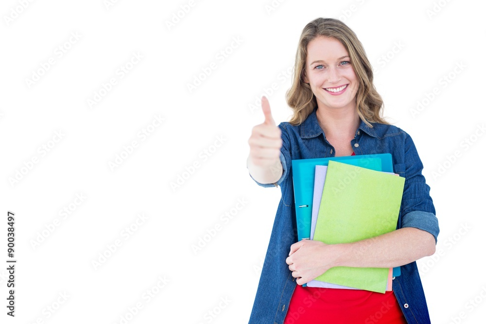 Composite image of smiling student holding notebook and file Composite image of smiling student holding notebook and file