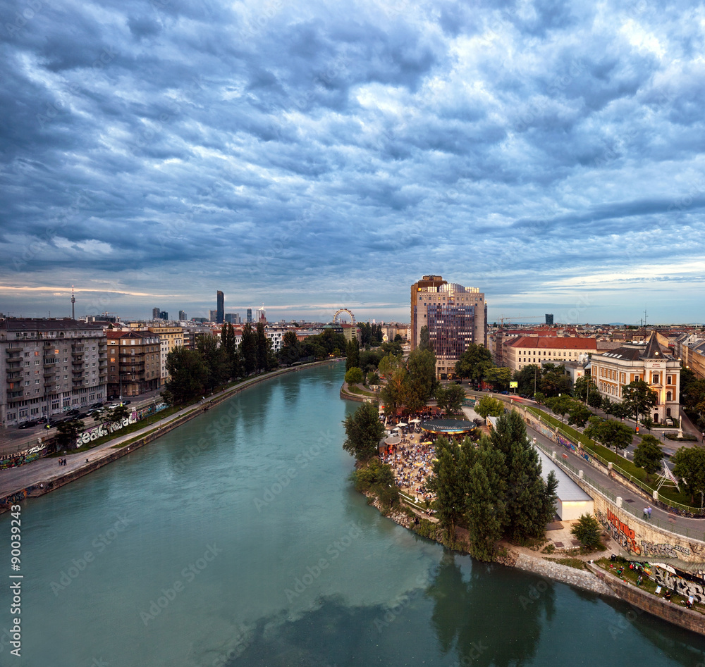 Fototapeta premium Vienna Danube Canal and the Herrmann beach bar at dusk