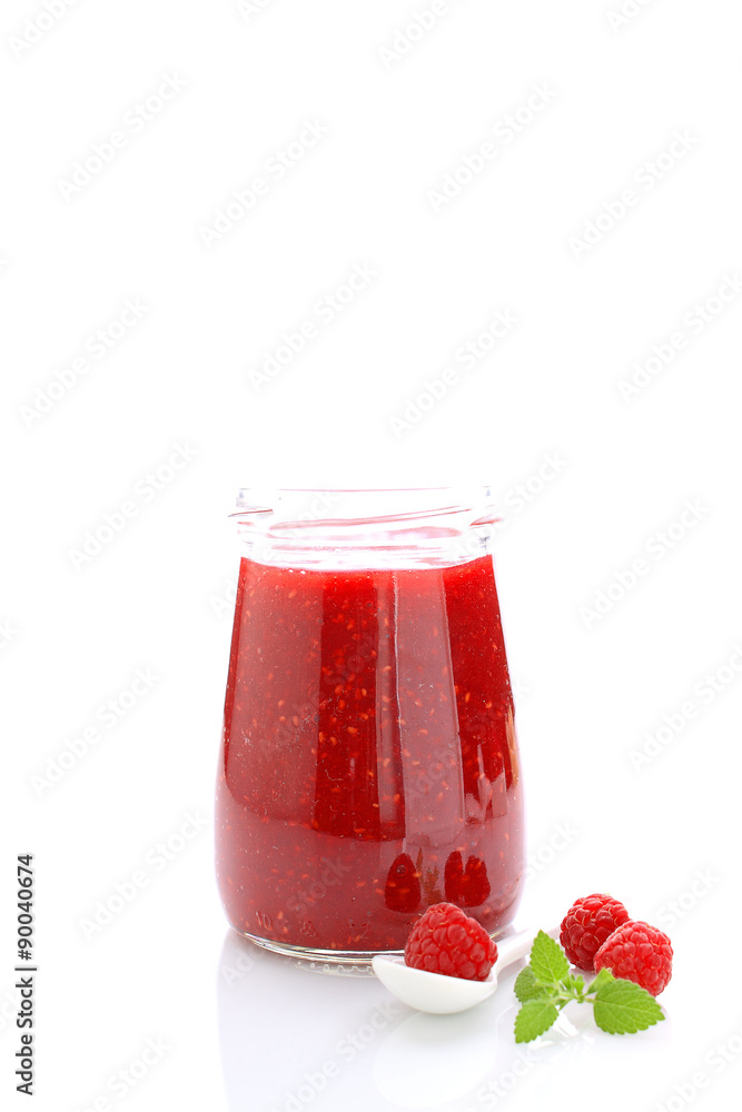 jar with raspberry jam on a white background jar with raspberry jam on a white background