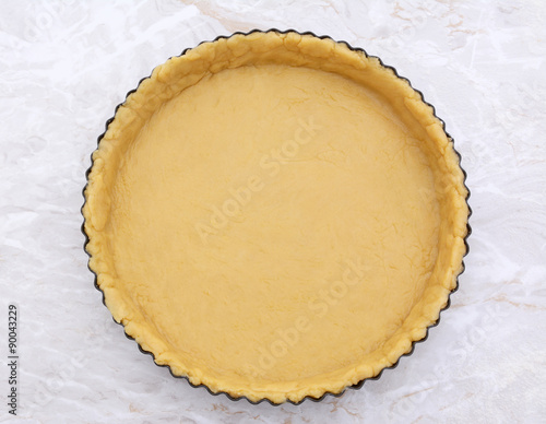 Flan tin lined with shortcrust pastry photo