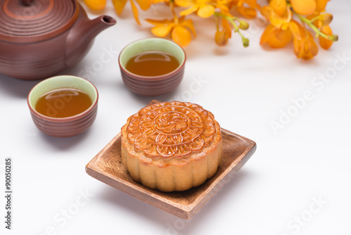 Mooncakes. Traditional Mooncak eand hot tea - Chinese cake photo