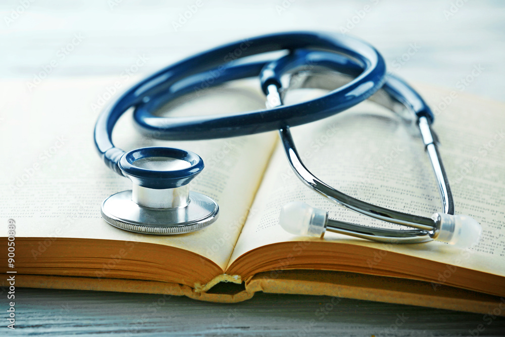 Stethoscope on open book close up Stethoscope on open book close up