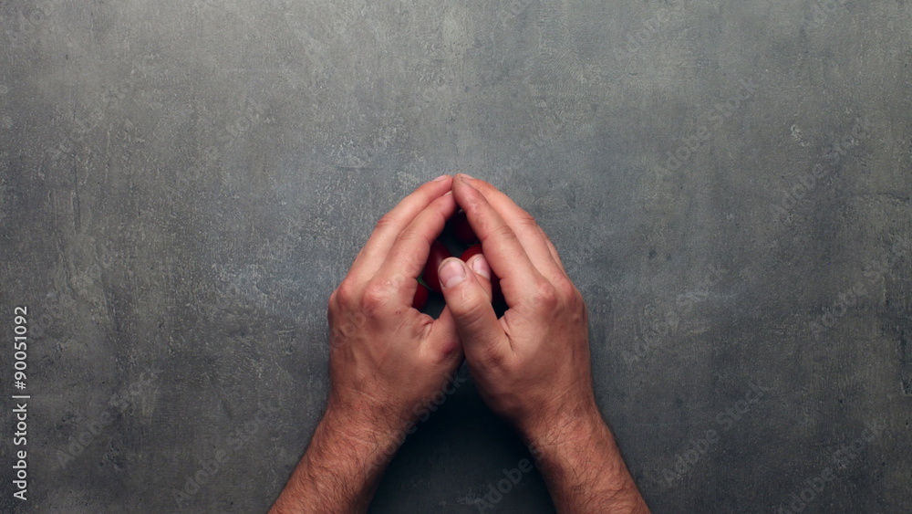 Man takes fresh vegetables in his hands, harvest concept - stop motion animation
