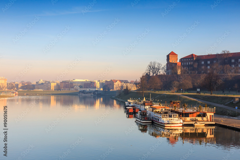 sunrise over the historic royal Wawel Castle in Cracow, Poland