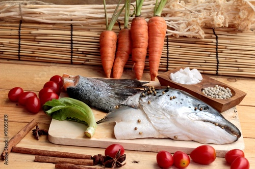 Salmon head and salmon tailfin for cooking. photo