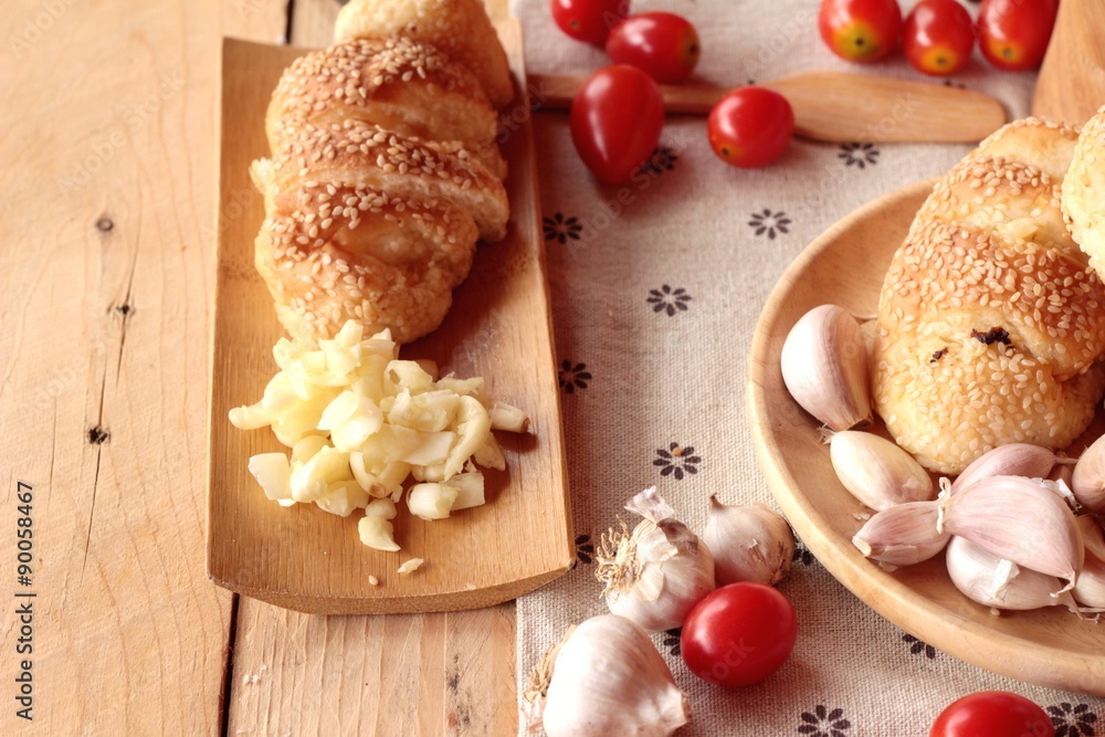 Garlic bread of herb delicious on wood background. Garlic bread of herb delicious on wood background.