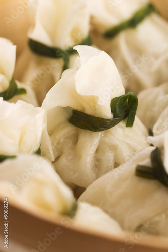 Chinese dumplings in bamboo steamers