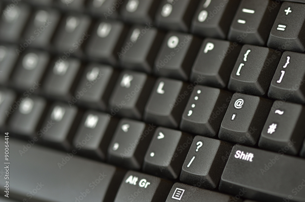 Computer keyboard. Close up of keys on an angle. Bottom right to top left. Computer keyboard. Close up of keys on an angle. Bottom right to top left.