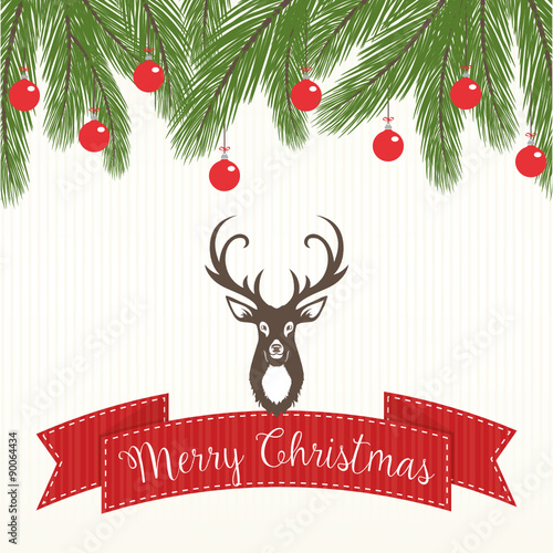 Weihnachtliche Dekoration mit Tannenzweigen und Hirsch