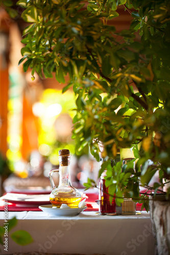 Oil bottle on a table at restaurant