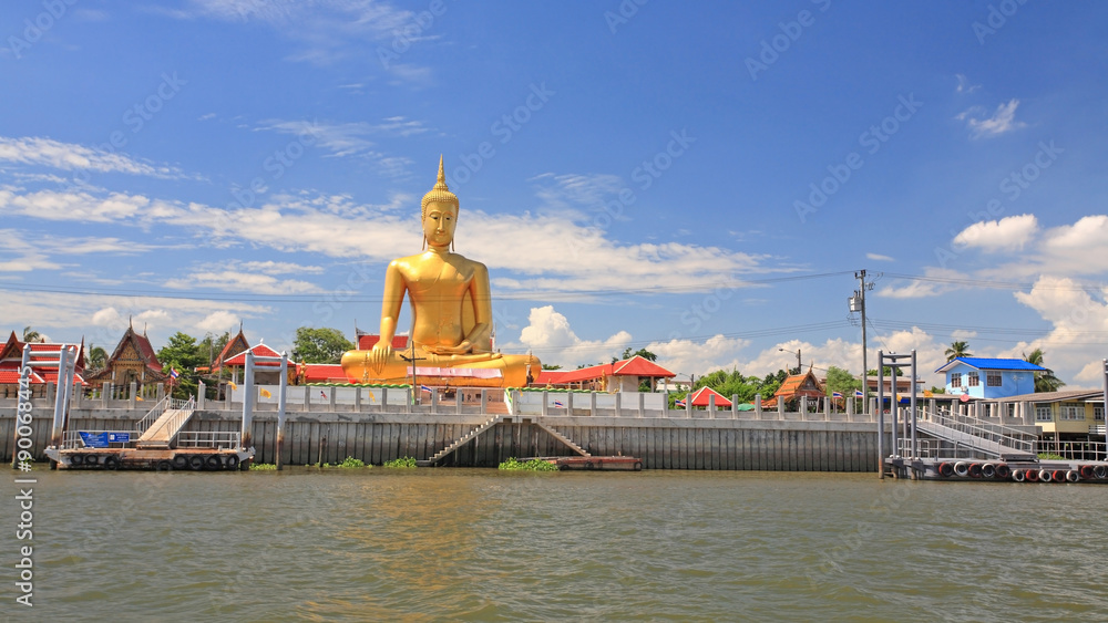Big gold buddha statue near Chao Phraya river