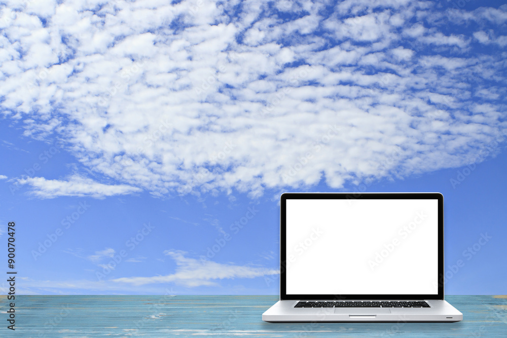Laptop computer on wooden floor with sky background. White screen Laptop computer on wooden floor with sky background. White screen