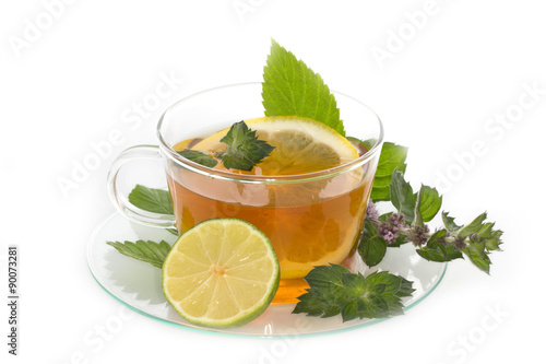 Cup of tea with lemon and mint isolated