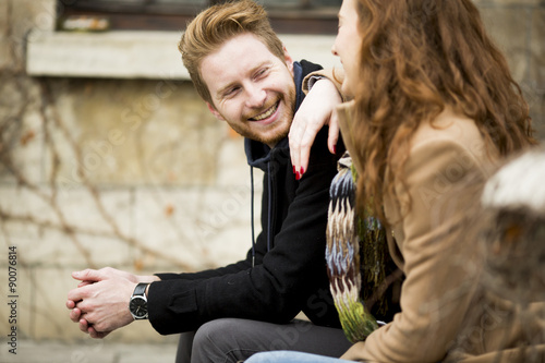 Young red hair couple at ou...