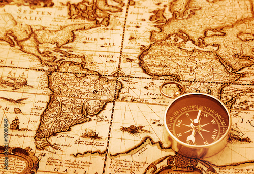 Compass on vintage map background