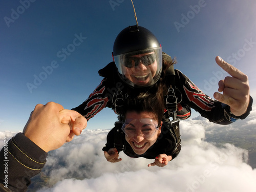 Fotografie Skydive tandem rock and roll sign