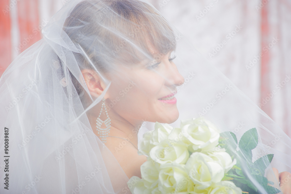 Naklejka premium Bride and groom in wedding studio photo session