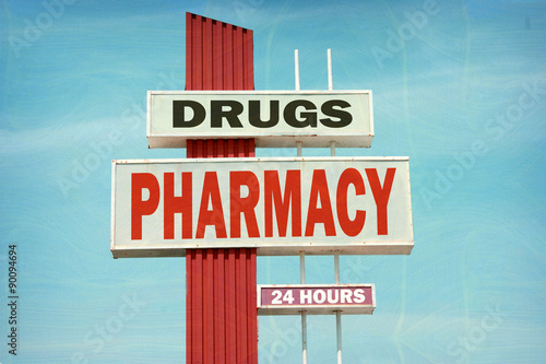 aged and worn vintage photo of pharmacy sign
