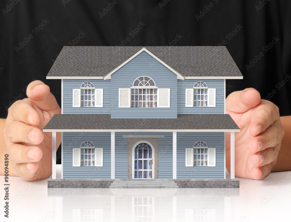 holding house representing home ownership holding house representing home ownership