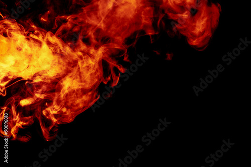 Abstract orange smoke hookah on a black background. © Vagengeim