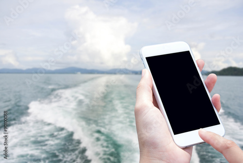 Woman hand with smartphone