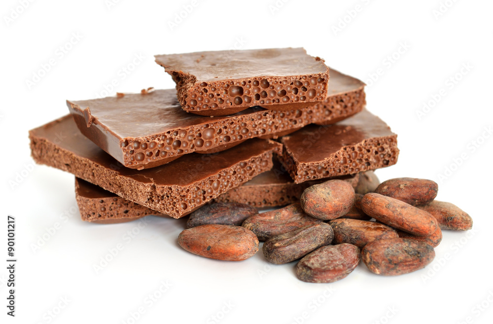 Milk air chocolate with Cocoa beans before roast. Milk air chocolate with Cocoa beans before roast.