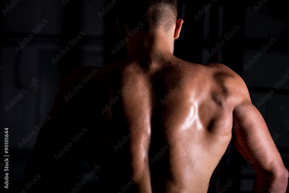 Fototapeta premium Muscular bodybuilder guy back