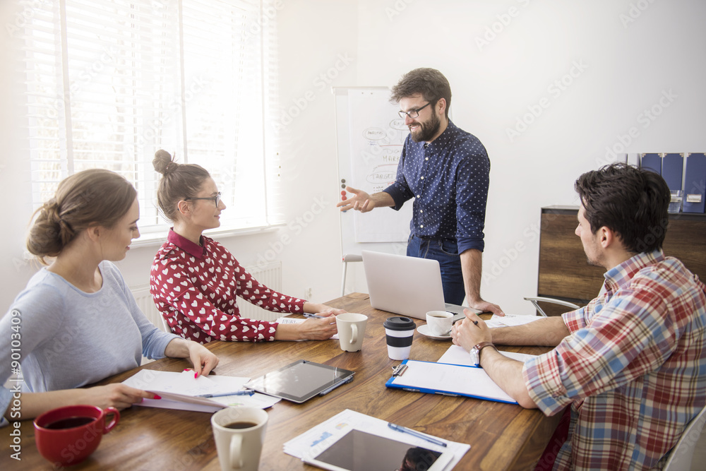 Fototapeta premium Workers gathered in the conference room