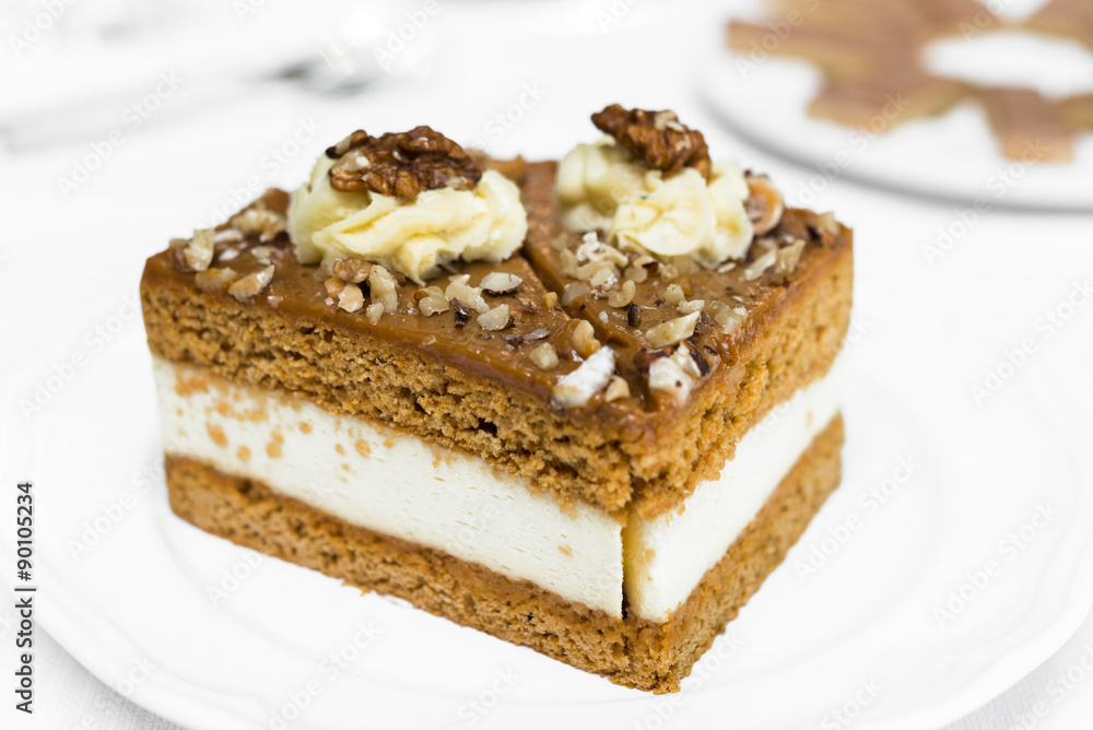 Toffee Cream Cake on White Plate Toffee Cream Cake on White Plate