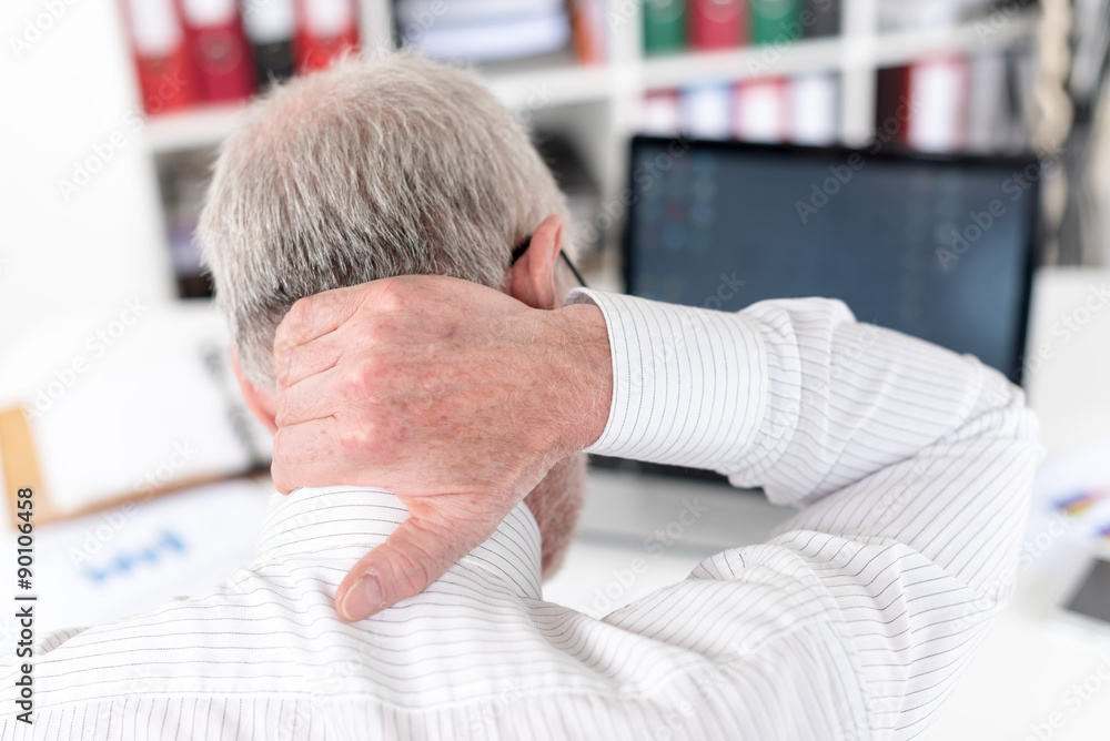 Fototapeta premium Businessman suffering from neck pain