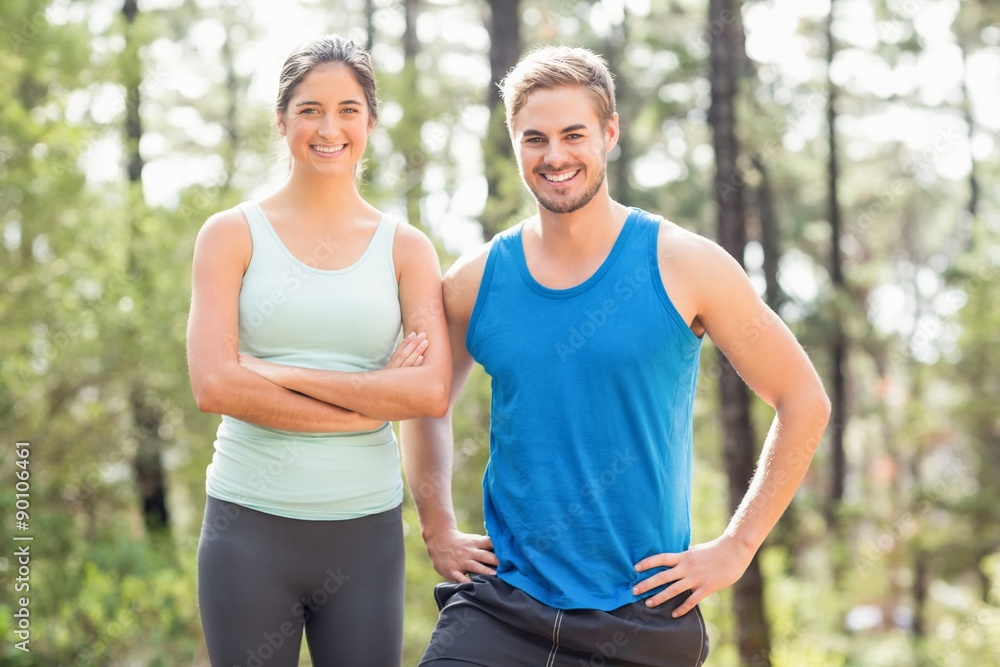 Fototapeta premium Happy joggers looking at camera