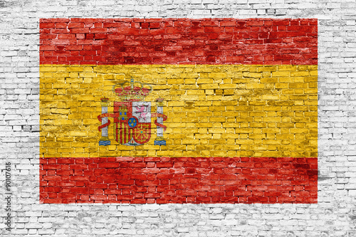 Spanish flag painted on brick wall
