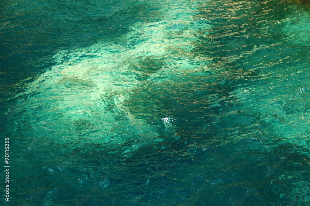 Obraz premium Clear water of the deep blue sea