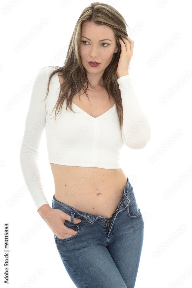 Sexy Young Woman Wearing a White Vest Top and Blue Jeans Sexy Young Woman Wearing a White Vest Top and Blue Jeans