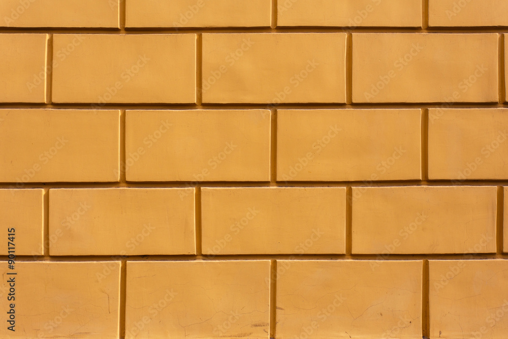 Background with fragment of yellow brick wall Background with fragment of yellow brick wall