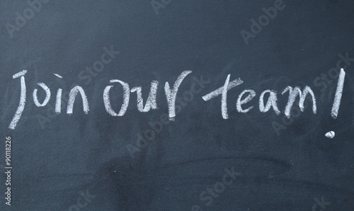 join our team text write on blackboard photo