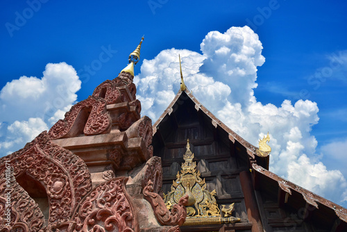 Beautiful temples amidst the clouds and sky    photo