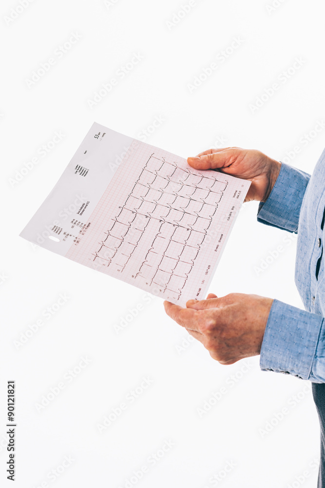 Obraz premium Hands with cardiogram