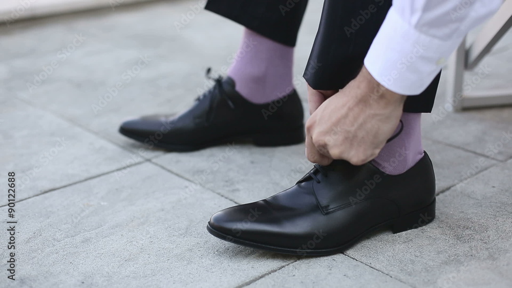 Businessman lace up black shoes Businessman lace up black shoes